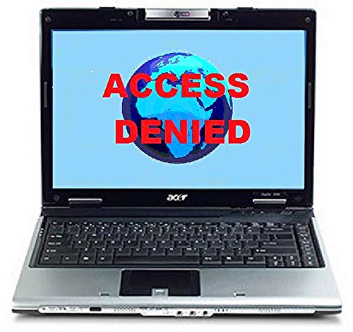laptop with the words &ldquo;access denied&rdquo; over a globe displaying on the screen