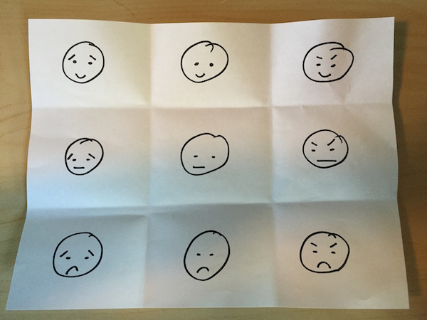 Images of simple expressive faces.