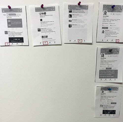 Image of several screenshots pinned up on a board.